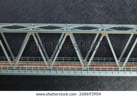 The miniature plastic model of railway bridge represent the railway construction object concept related idea.