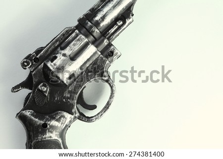 The artificial vintage plastic toy gun represent weapon concept related idea