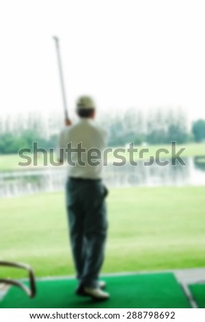 Blurry focus scene of golf course master swing action represent the golf sport course concept related idea.