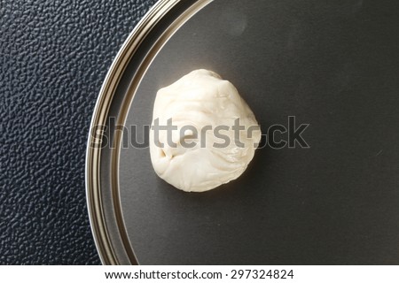 White powder for roti raw material put on the tinplate represent the Indian food background concept related idea