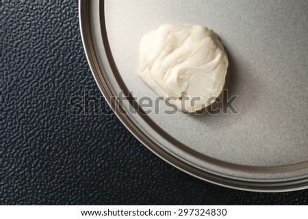 White powder for roti raw material put on the tinplate represent the Indian food background concept related idea