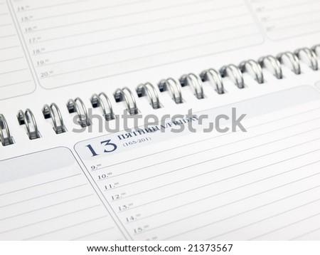 blank calendar with spiral binding  closeup. shallow dof