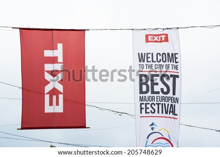 NOVI SAD,SERBIA-JULY 11th,2014: Flags of famous EXIT music festival hanging in the centre of Novi Sad on July 11th 2014, Novi Sad, Republic of Serbia