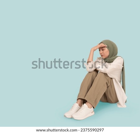 Similar – Image, Stock Photo Stressed woman sitting at table with laptop