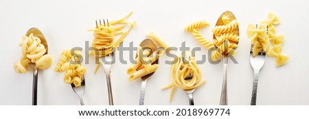 Similar – Image, Stock Photo Composition of pasta and kitchenware on table