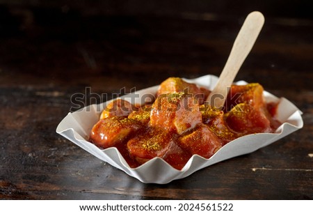 Similar – Foto Bild Würstchen mit Currysoße und Pommes Frites