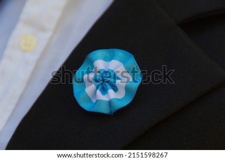 an Argentine cockade on the lapel of the jacket, celebrating the national dates ストックフォト © 