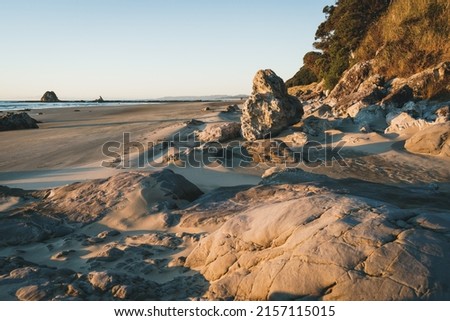 A beautiful shot of the rock formations against blue sky on a sunny day at Mangawhai Heads Beach, New Zealand Zdjęcia stock © 