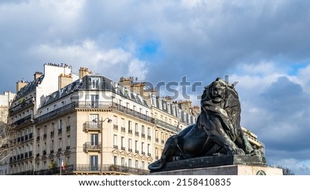 Paris, France, beautiful lion place Denfert-Rochereau in the 14e arrondissement, with typical buildings Photo stock © 