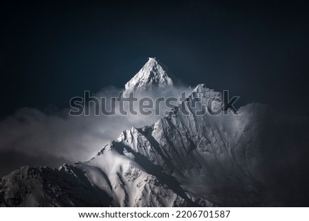 Similar – Image, Stock Photo Peaks of high snowy mountains at sunset