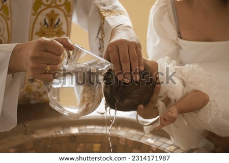 A closeup shot of Catholic Baptism in Philippines 商業照片 © 