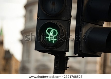 Similar – Image, Stock Photo LGBT pedestrian traffic light signals symbolizing equality