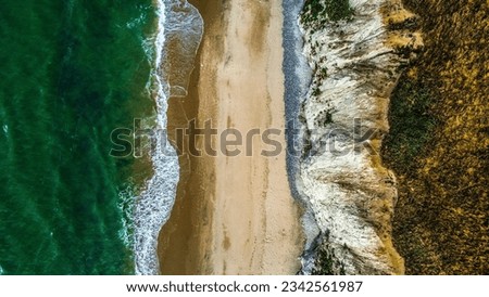 Similar – Image, Stock Photo Rocky cliffs near wavy ocean in sunlight