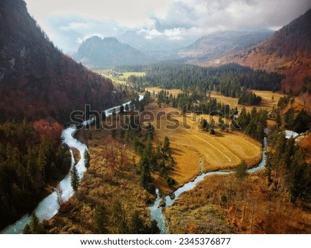 An aerial view of beautiful Grunau im Almtal village with rivers and lush vegetation in Austria Stok fotoğraf © 