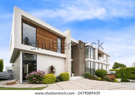 Similar – Image, Stock Photo Facade of a modern high-rise building with thunderclouds.