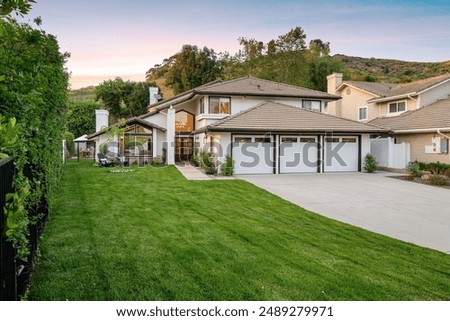 Image, Stock Photo Three garages in a residential area, one of them is open