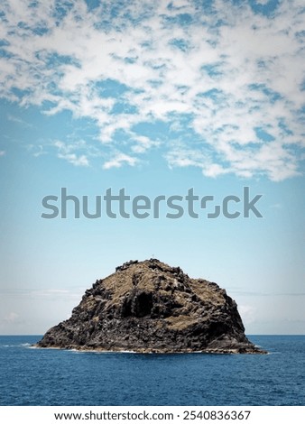 Similar – Image, Stock Photo Rocky island in sea against sunset sky aerial view