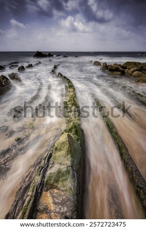 Image, Stock Photo Rocky formations in flowing sea