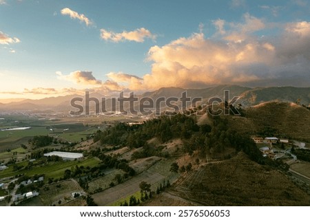 Similar – Image, Stock Photo Dramatic sky during sunset over a lake in Cambodia