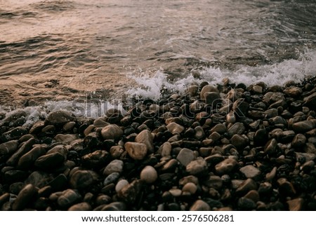 Similar – Foto Bild Felsenküste und friedliches Meer bei Sonnenuntergang