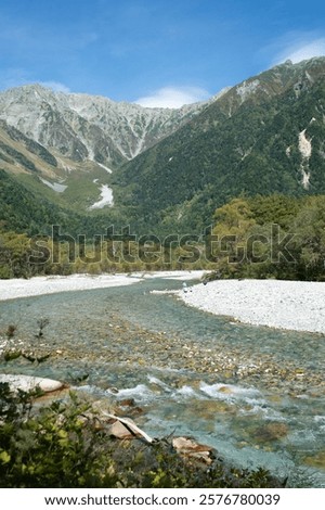 Similar – Image, Stock Photo beautiful clear mountain river Ara in long exposure with mountain in golden sunlight in background, Pyrenees, Spain