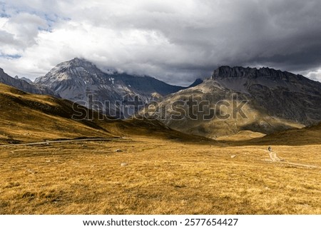 Similar – Image, Stock Photo Landscape with lonely hiker