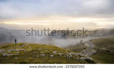 Similar – Image, Stock Photo Landscape with lonely hiker