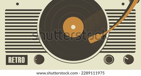 Tape recorder for playing vinyl records retro background.