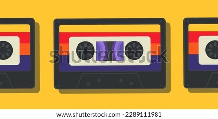 Retro audio cassettes in a row on a yellow background. Old school concept.
