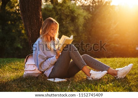 Similar – Image, Stock Photo Delighted teen woman taking selfie on smartphone