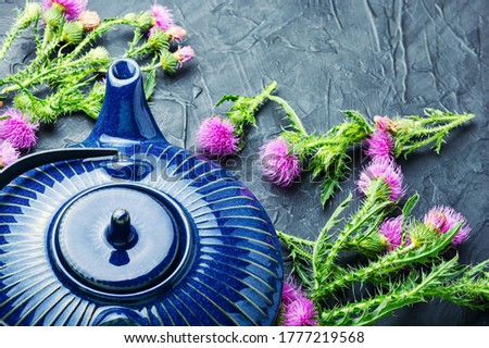 Herbal tea or herbal drink in a ceramic teapot.Healing herbs.