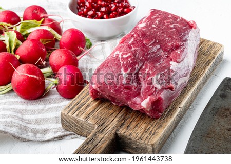 Raw beef meat steak Tenderloin fillet mignon set, on white stone background