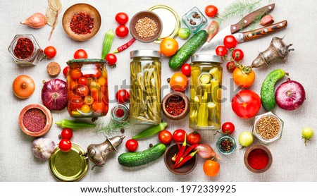 Preserves vegetables in glass jars.Various canned vegetables.Marinated food.