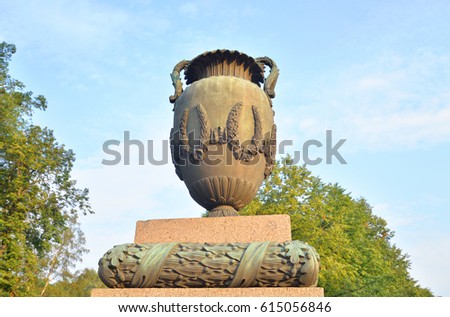 Vase in neoclassical style on Moskovsky Avenue in Saint Petersburg at sunny summer evening.