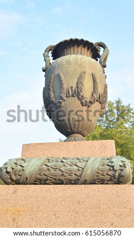 Vase in neoclassical style on Moskovsky Avenue in Saint Petersburg at sunny summer evening.