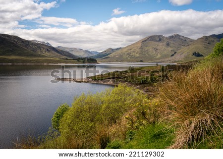 Loch Cluanie is a lake in the Northwest Highlands of Scotland at the south-east end of Glen Shiel.