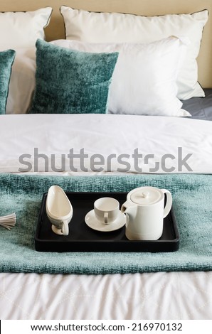 tea set on black tray in modern bedroom at home