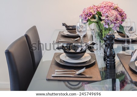 dinning room with dinning set on glass table at home