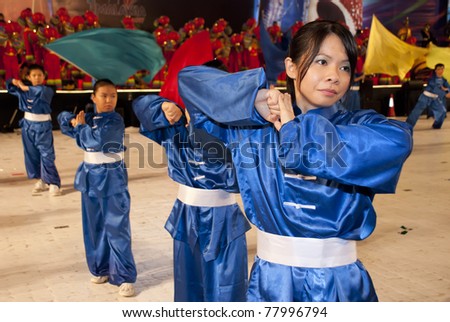 KUALA LUMPUR, MALAYSIA-MAY 21: Wushu athlete, a traditional Chinese martial arts performs the dance during the celebration of Color of 1 Malaysia on May 21, 2011 in Kuala Lumpur, Malaysia.