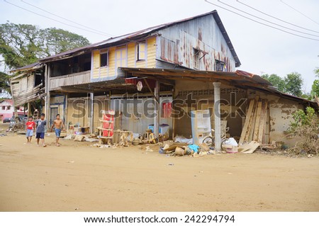 TANAH MERAH, KELANTAN - JANUARY 2: Impact of floods as high as approximately 2 meters is clearly visible in the wooden wall in the house at Kusial Baru village, Tanah Merah, Kelantan on Janury 2, 2015