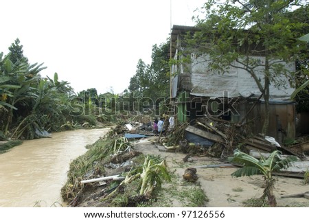 KUALA LUMPUR - MARCH 8: Situation after flash floods that hit the village of Lembah Jaya Utara, in Ampang, near Kuala Lumpur, Malaysia on March 8, 2012.