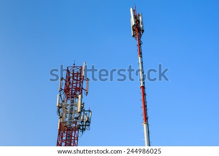 radio communications towers under blue sky