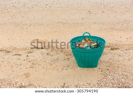 Green Waste basket on the beach