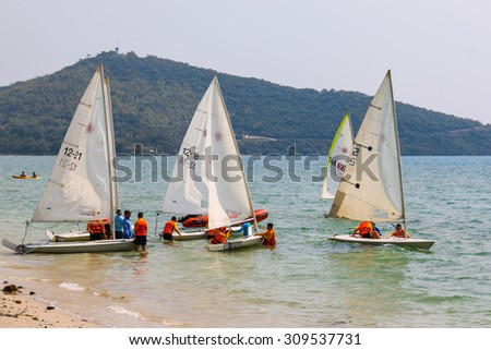 SATTAHIP, THAILAND - AUGUST 25, 2015 : The group of sailing boats are practice for next completition. This is the nice view of sailing clubs in Sattahip Chonburi, THAILAND on August 25, 2015