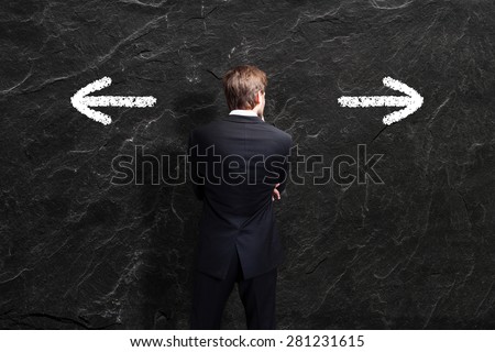 businessman has to decide between two directions
