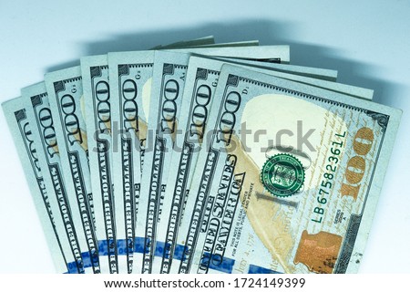 Heap of Dollar Bills on white background.   Dollars Closeup Concept. American Dollars Cash Money. One Hundred Dollar Banknotes. Cash of hundred dollar bills, dollar background.