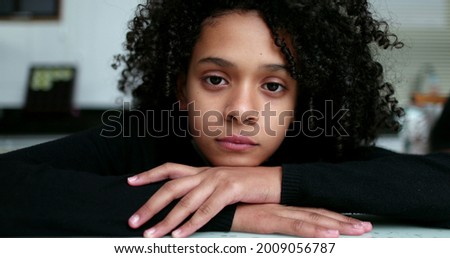 Similar – Image, Stock Photo Portrait of a sad, crouching man in a black hoodie