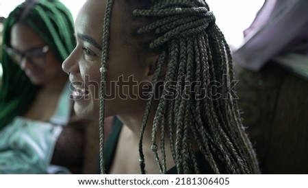 Two black female friends with box braids hairstyle. Young latina women with braided hair Foto stock © 