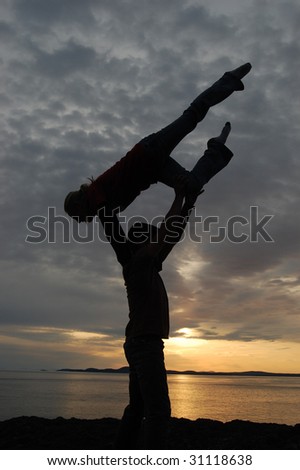 Couple doing gymnastics