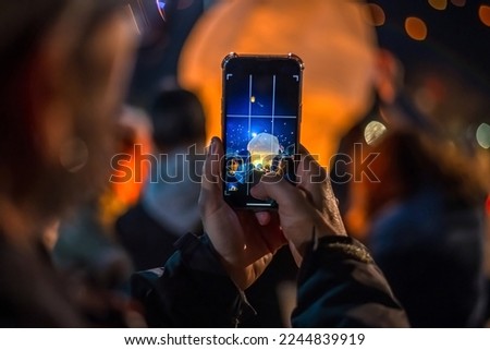 Similar – Image, Stock Photo Unrecognizable traveler with flashlight exploring foggy forest